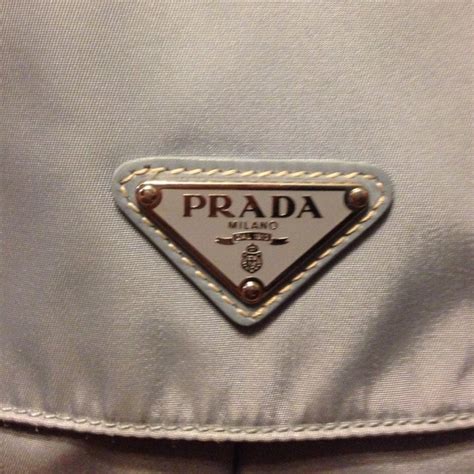 prada bag gold 2 number lock|Prada bag counterfeit.